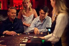 Live casino studio setup with dealer and cards